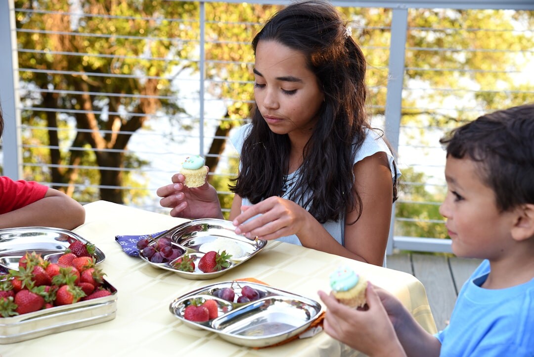 family enjoying meal outdoors